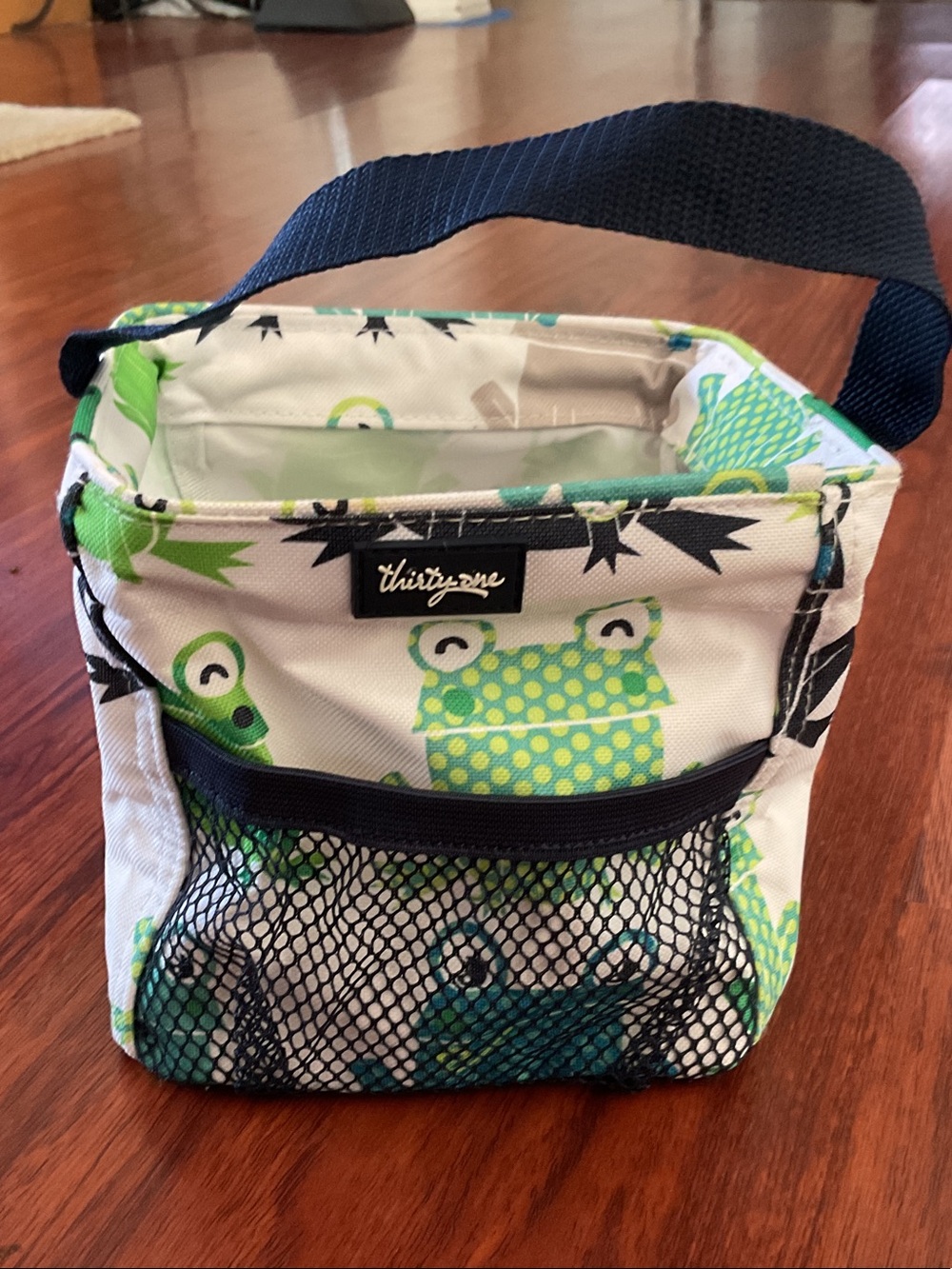 thirty-one Green & Navy Frog Print Organizer Pouch approximately 6” x 6”.